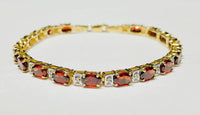 Oval Red Garnet Bracelet (10K).
