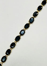 Oval Blue Sapphire Eternity Bracelet (10K).