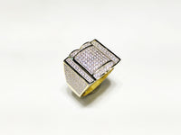 In the center: yellow sterling silver men's rings set with cubic zirconia in a micro pave setting standing upangle view made by Popular Jewelry in New York City