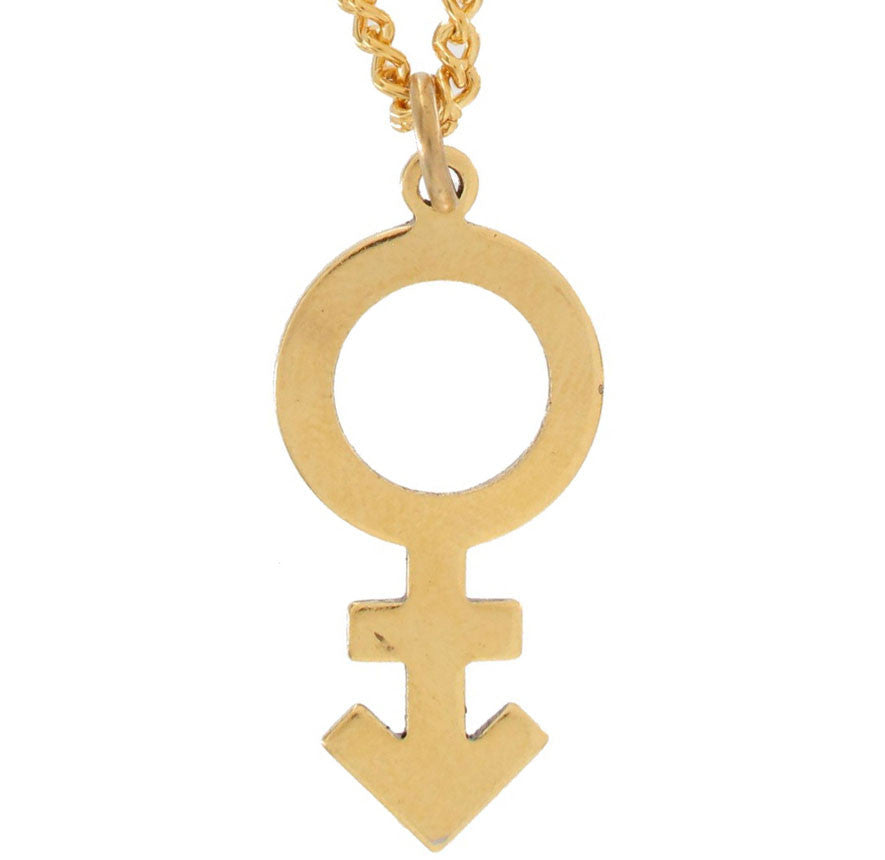 In the center: a male gender symbol pendant in 14 karat yellow gold accompanied by a gold necklace by Popular Jewelry in New York City