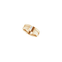 Diagonal view of a 14k rose gold notched ring featuring a vertically set white straight baguette diamond in the center