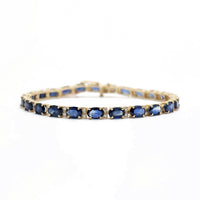 Oval Blue Sapphire and Diamond Eternity Bracelet (14K).