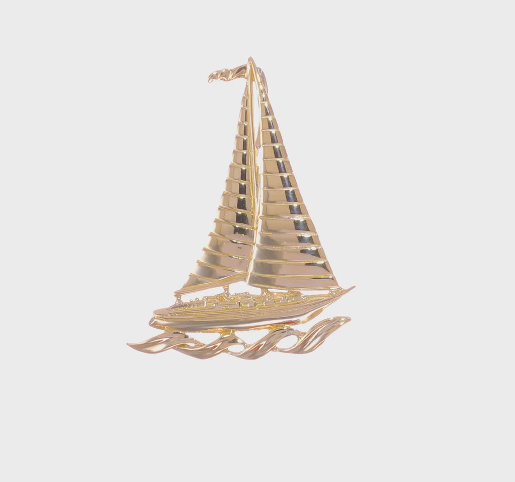 360 view of a 14K yellow gold Sailboat over Sea Pendant