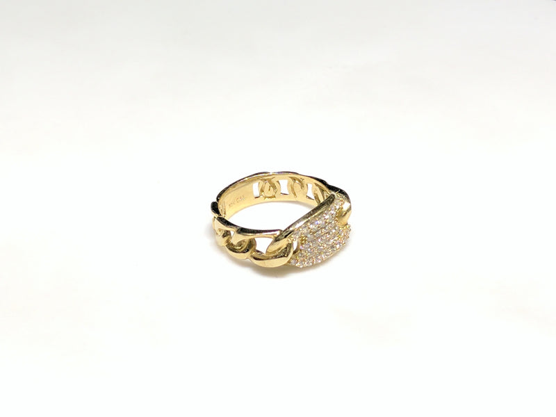 In the center: a 10 karat yellow gold gucci link style lady's ring set with cubic zirconia in a micro pave setting laying flat facing vieweropposite angle made by Popular Jewelry in New York City