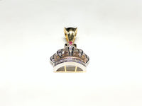 In the center: a 14K rose, white, and yellow gold king's crown pendant set with round and princess cut cubic zirconia laying flat front view made by Popular Jewelry