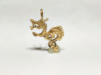 In the center: a 14 karat yellow gold diamond cut eastern asian dragon standing in frontal view - Popular Jewelry