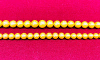 Necklace tal-perla Golden Southsea (Gradwat)
