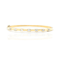 Seven Channel-Set Diamond Bangle Bracelet (14K).