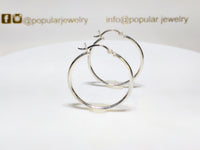 A pair of sterling silver plain high polished finish hoop earrings standing - Popular Jewelry