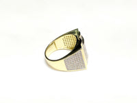 In the center: yellow sterling silver men's rings set with cubic zirconia in a micro pave setting laying flat side view made by Popular Jewelry in New York City