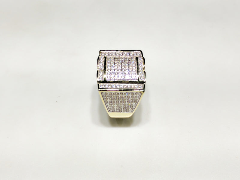 In the center: yellow sterling silver men's rings set with cubic zirconia in a micro pave setting standing up side view made by Popular Jewelry in New York City